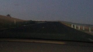 Teen gives head in the car and then finishes it outside over the freeway