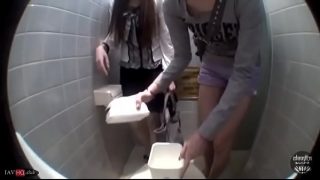 Japanese Friends Pissing in Trash Bin